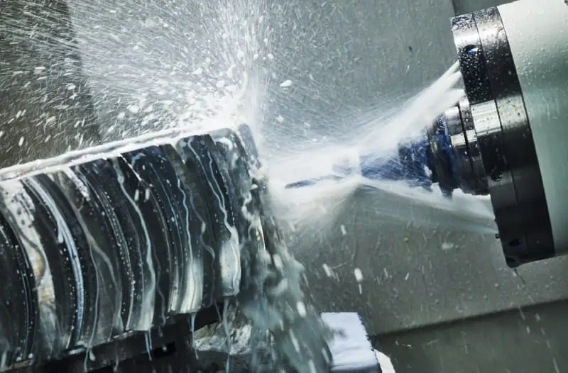 Machining with coolant spray
